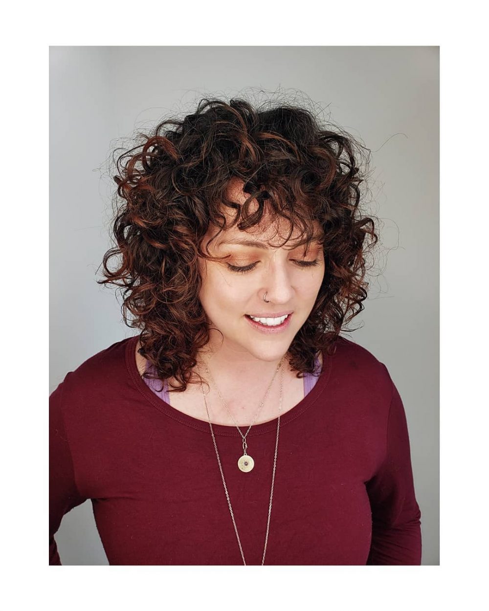 The 21 Cutest Examples of Naturally Curly Hair with Bangs