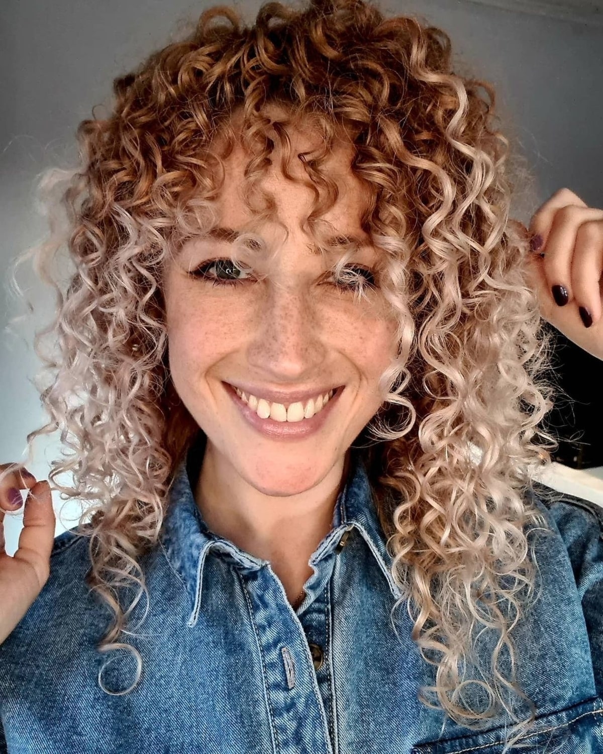 The 21 Cutest Examples of Naturally Curly Hair with Bangs