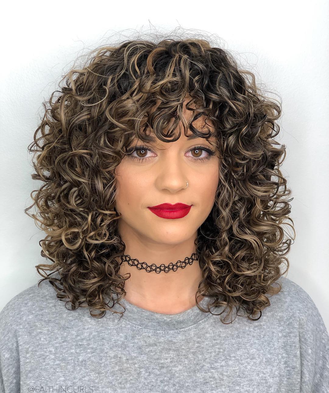 curly hair and bangs