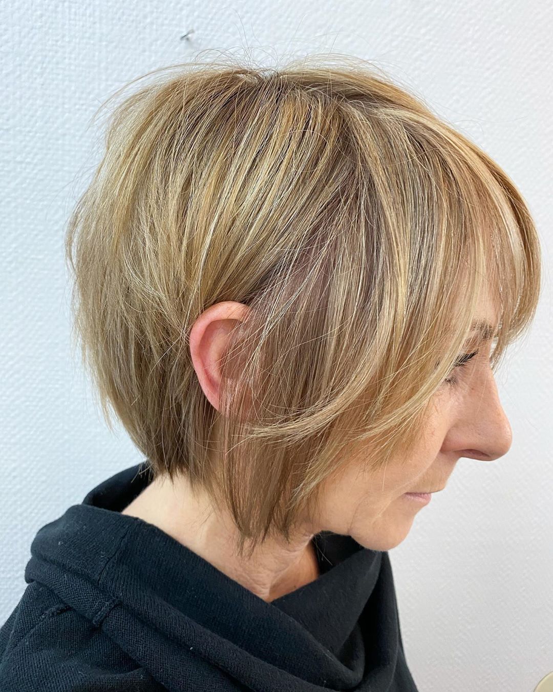 15 Slimming Short Hairstyles for Women Over 50 with Round Face Shapes
