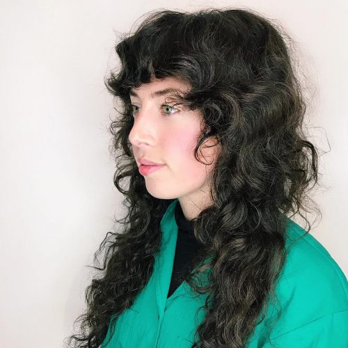 21 cute examples of naturally curly hair with bangs