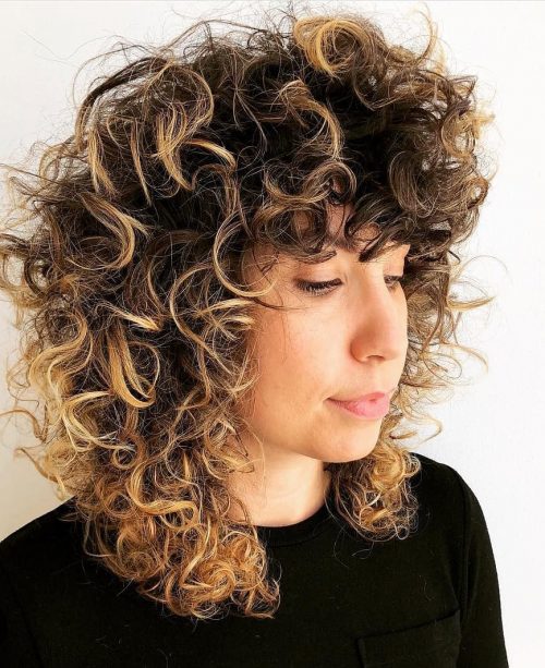 The 21 Cutest Examples of Naturally Curly Hair with Bangs