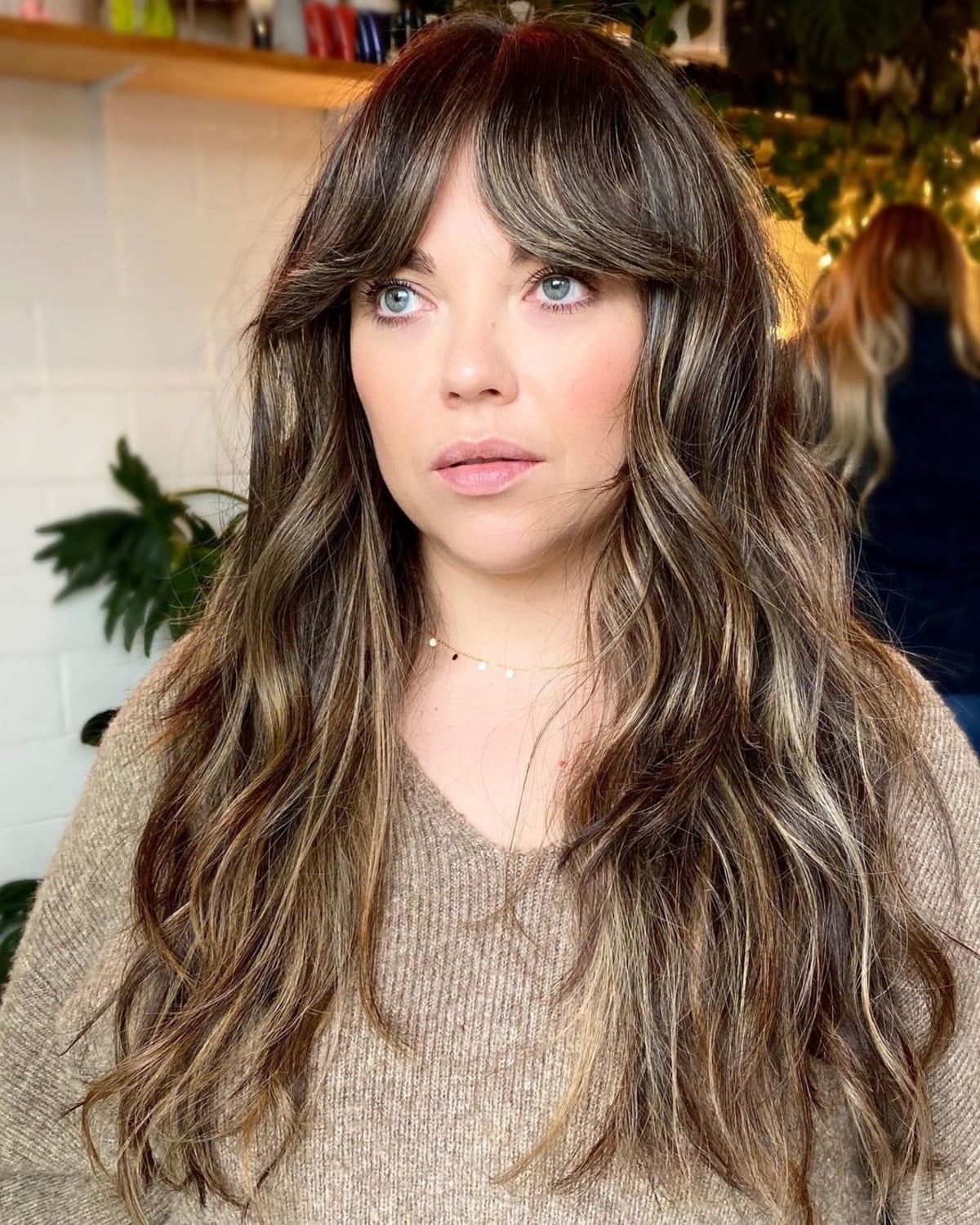 21 Trendiest Ways to Wear Long Curtain Bangs, According to Stylists