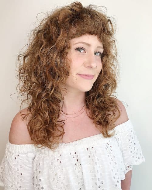 21 cute examples of naturally curly hair with bangs