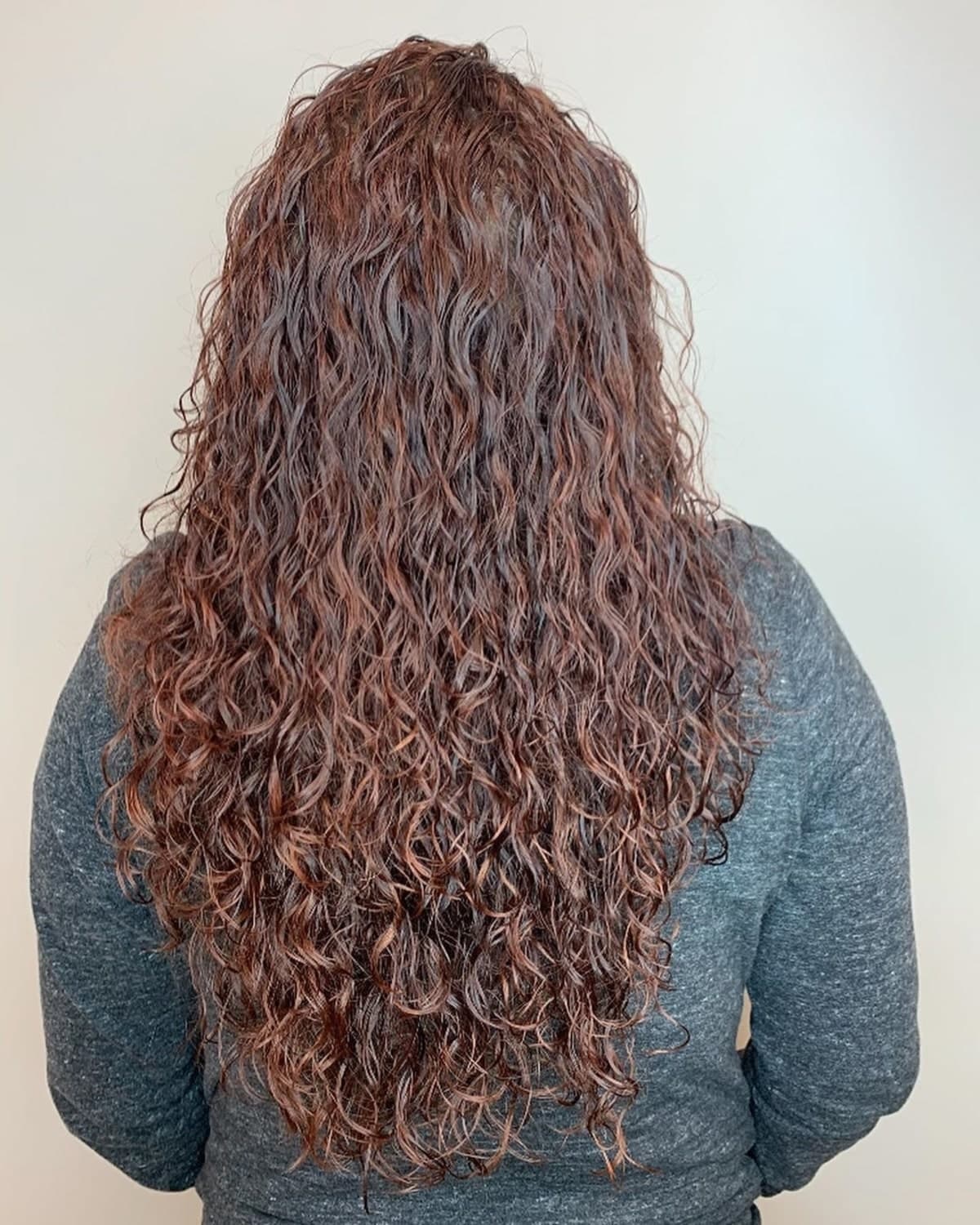 spiral perm long hair